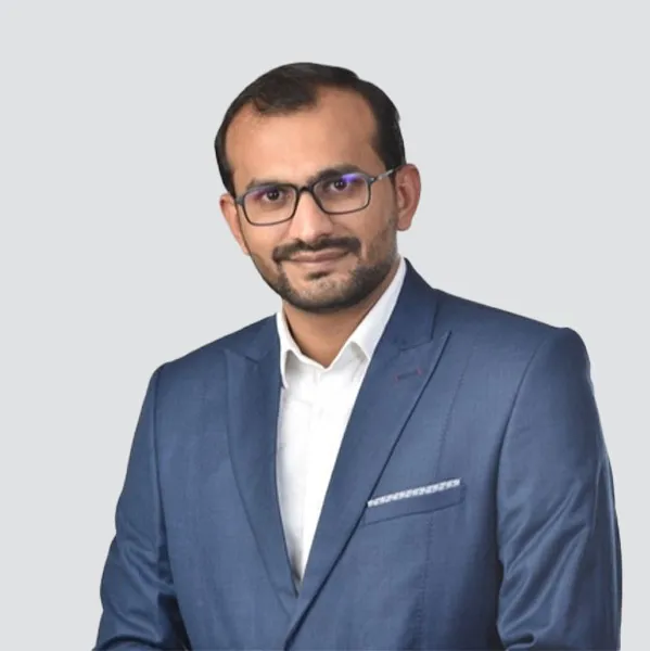 Dr Renish Bera